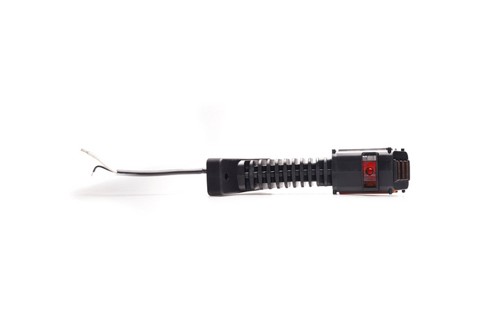 Faro di segnalazione a LED SPOT WAŚ 2554L W297.4.1, a sinistra, su braccio.