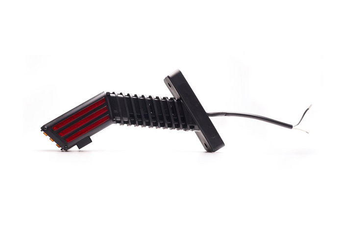 Faro di segnalazione a LED SPOT WAŚ 2554L W297.4.1, a sinistra, su braccio.